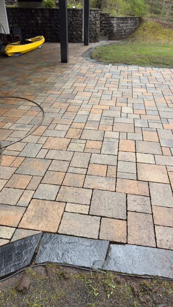 Close-up of mixed-tone stone pavers on a walkway