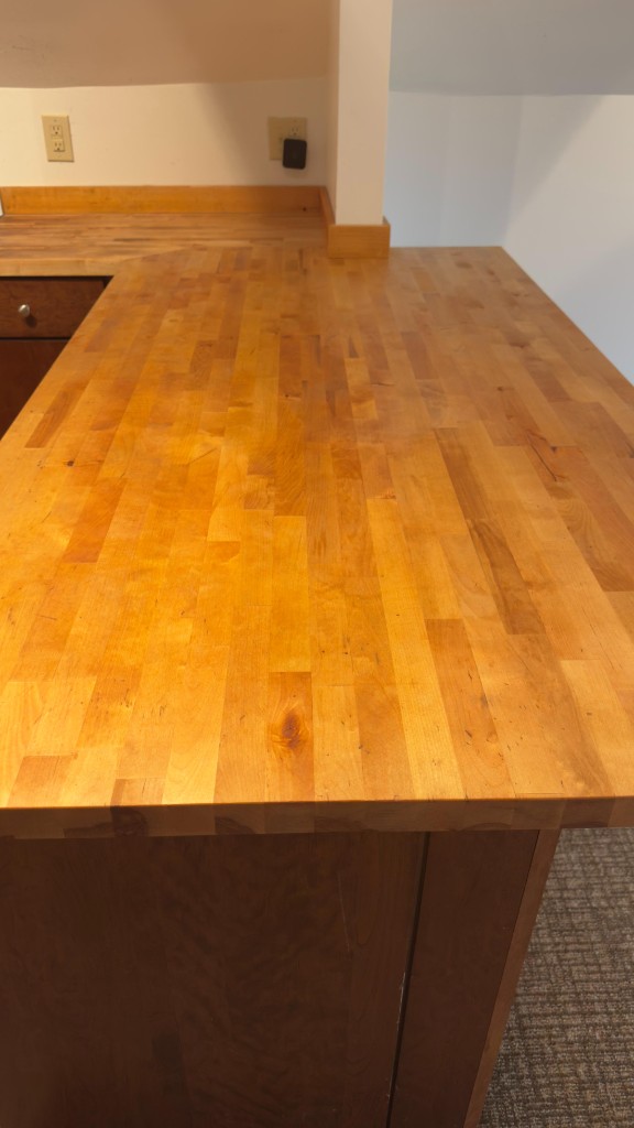 Butcher-block countertop after refinishing by Servidori Painting