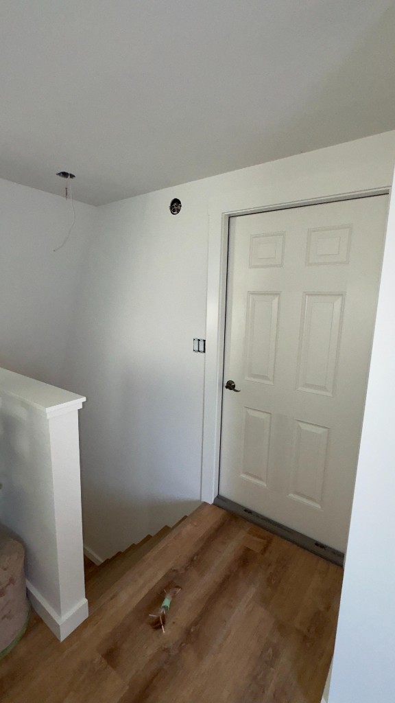 Stairwell landing after interior painting by Servidori Painting