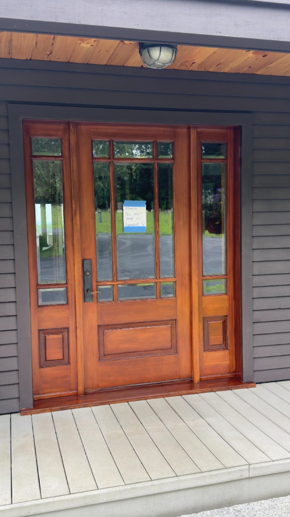 Wood front door and sidelights after staining by Servidori Painting