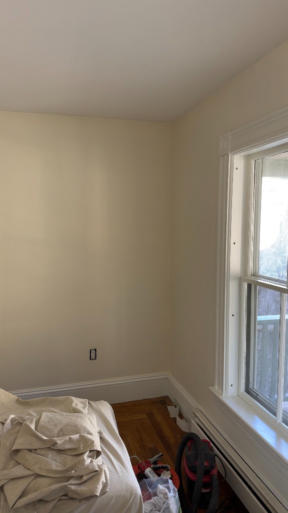Wall corner after repair and painting by Servidori Painting
