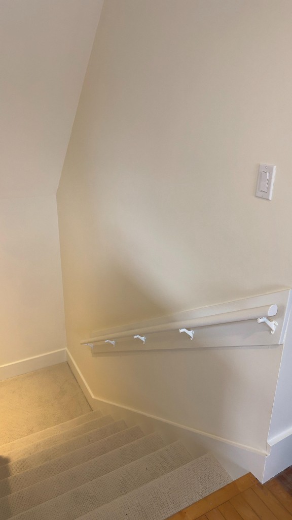 Stair hall walls after interior painting by Servidori Painting