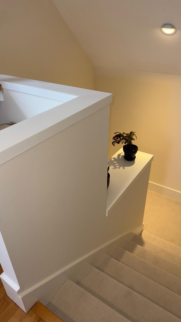 Stair landing after interior painting by Servidori Painting